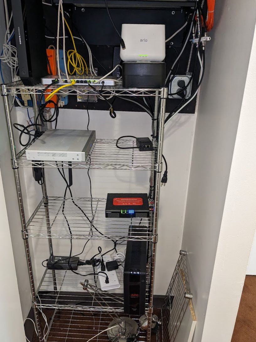 Messy IT closet before cleanup